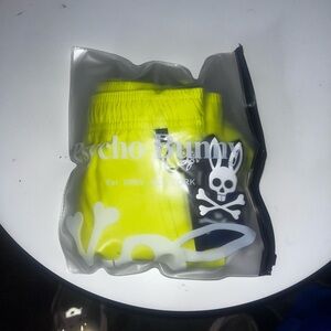 Psycho Bunny Bright Yellow Swim Trunks.
